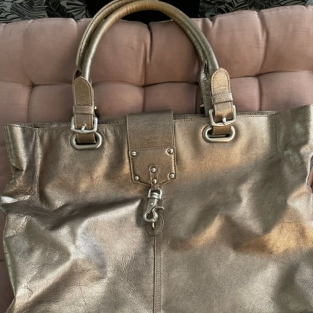 DKNY large gold leather tote bag - gently used; in good condition